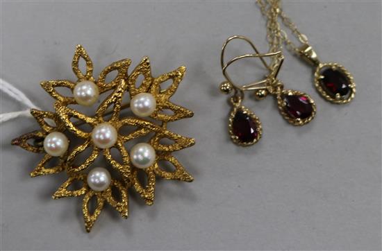 A 1970s textured 9ct gold and cultured pearl brooch and a 9ct gold gem set pendant necklace and pair of matching earrings.